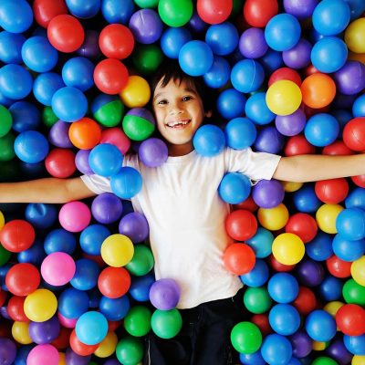 Boy in ball pit